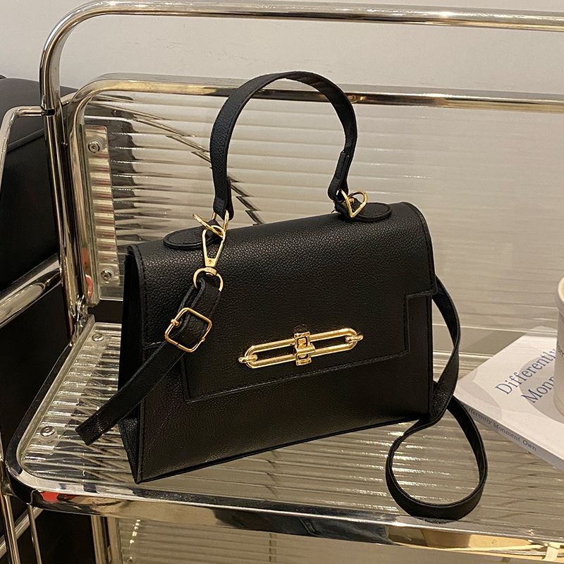 Shop black luxury crossbody bag for women.