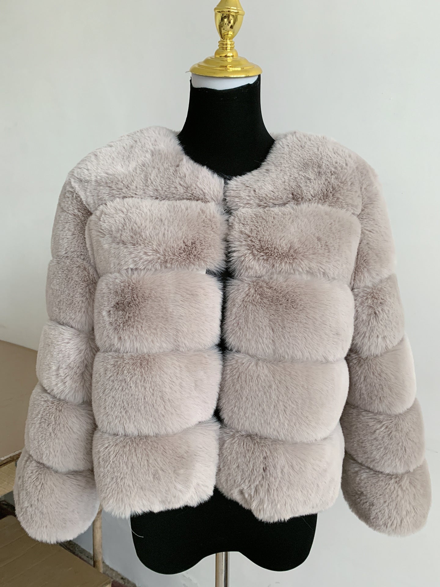 Buy elegant warm faux fur coat.